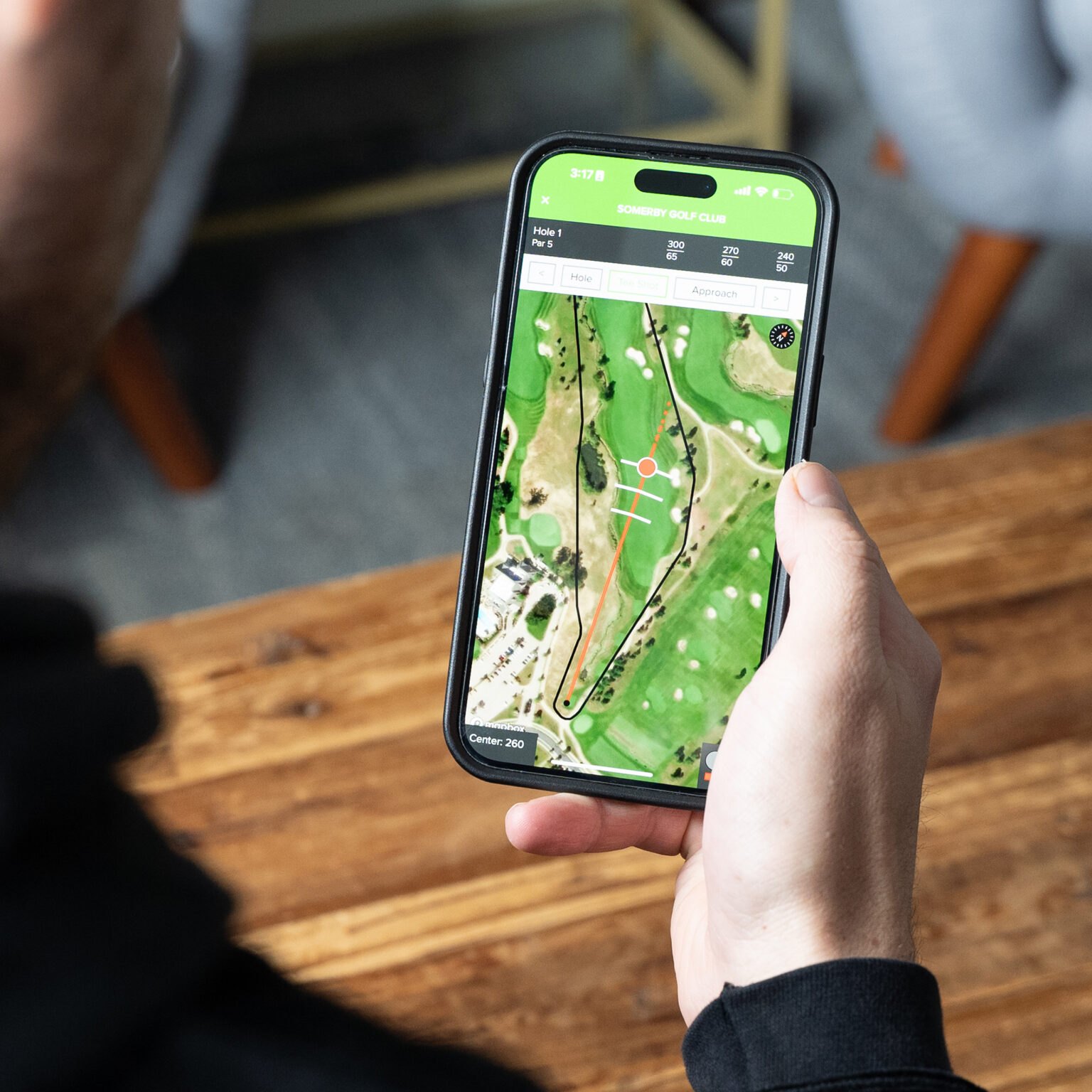 DECADE official brand photo of the course-management GPS app on a phone