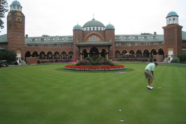 Medinah Country Club clubhouse and putting green in Medinah, Illinois, host of the 2026 Presidents Cup.