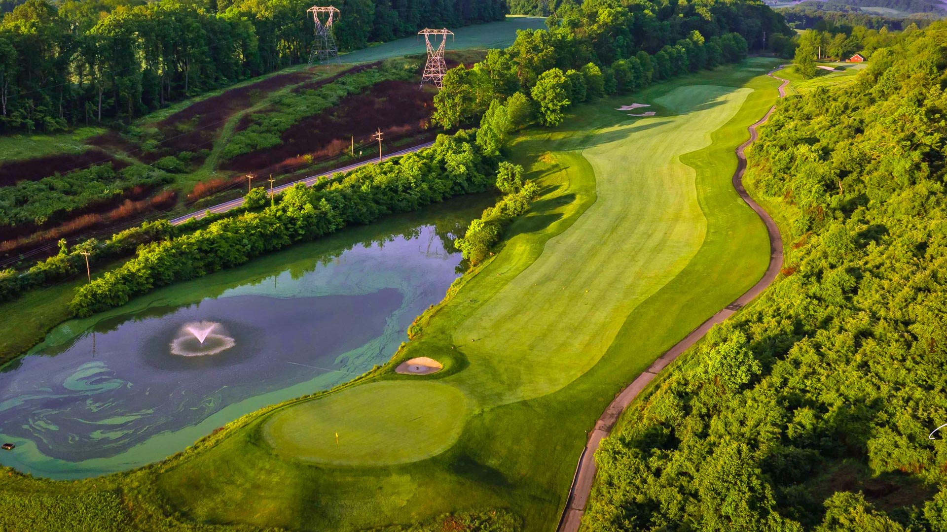 Aerial view of a green and pond at Broad Run Golfer's Club in West Chester