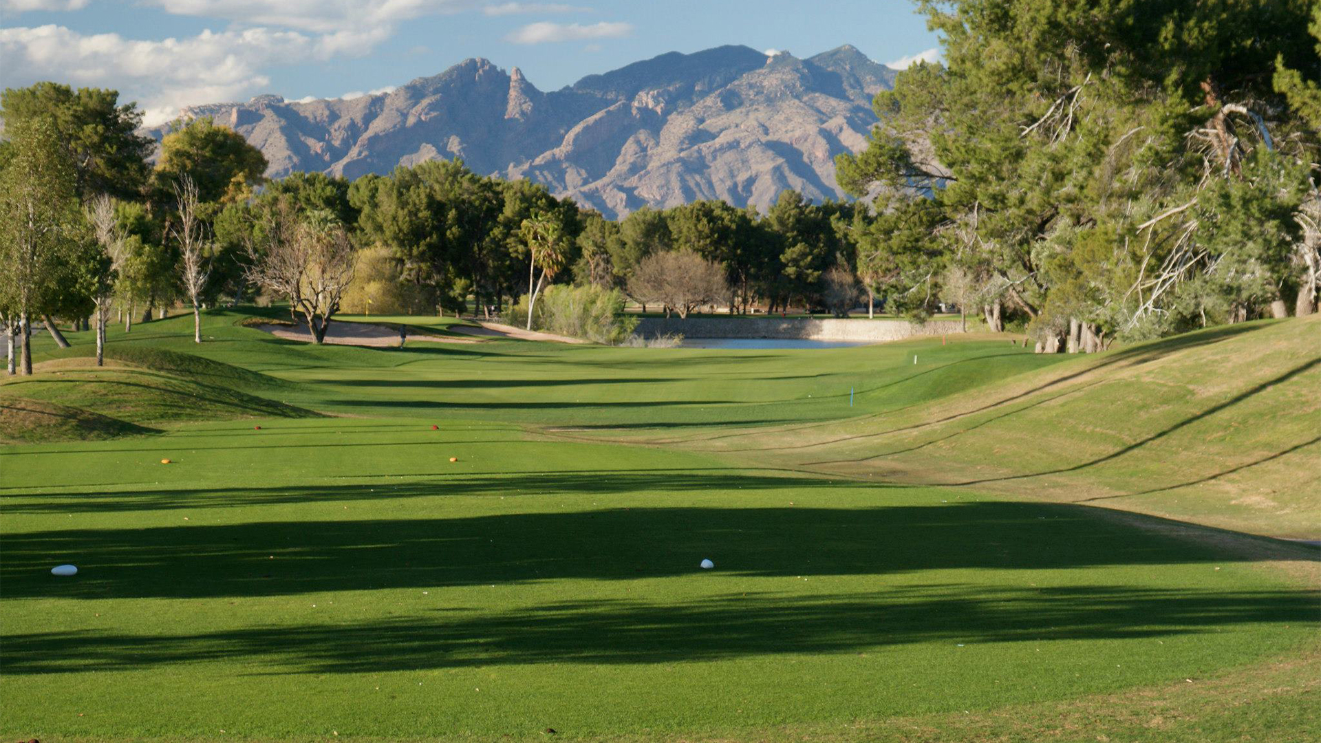 Fairway at a Tucson City Golf course with desert mountains on the horizon.